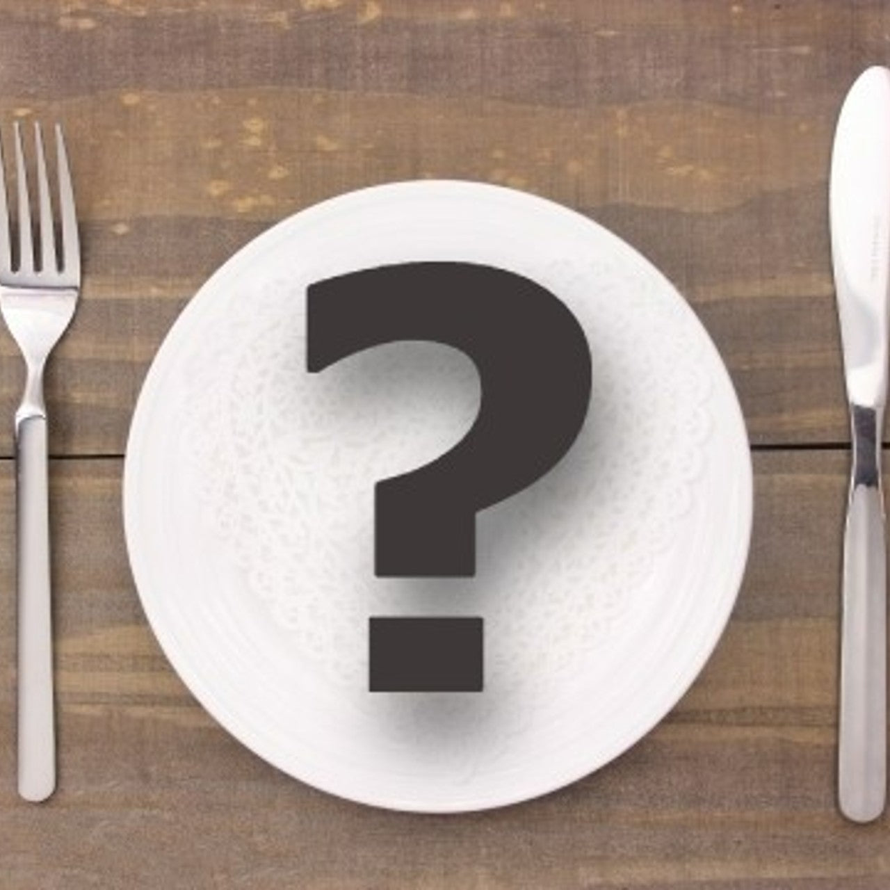 Question mark in a plate with utensils