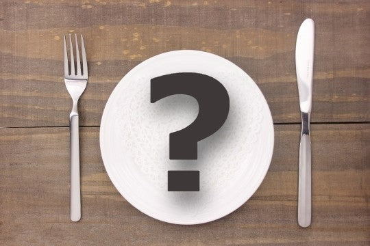 Question mark in a plate with utensils